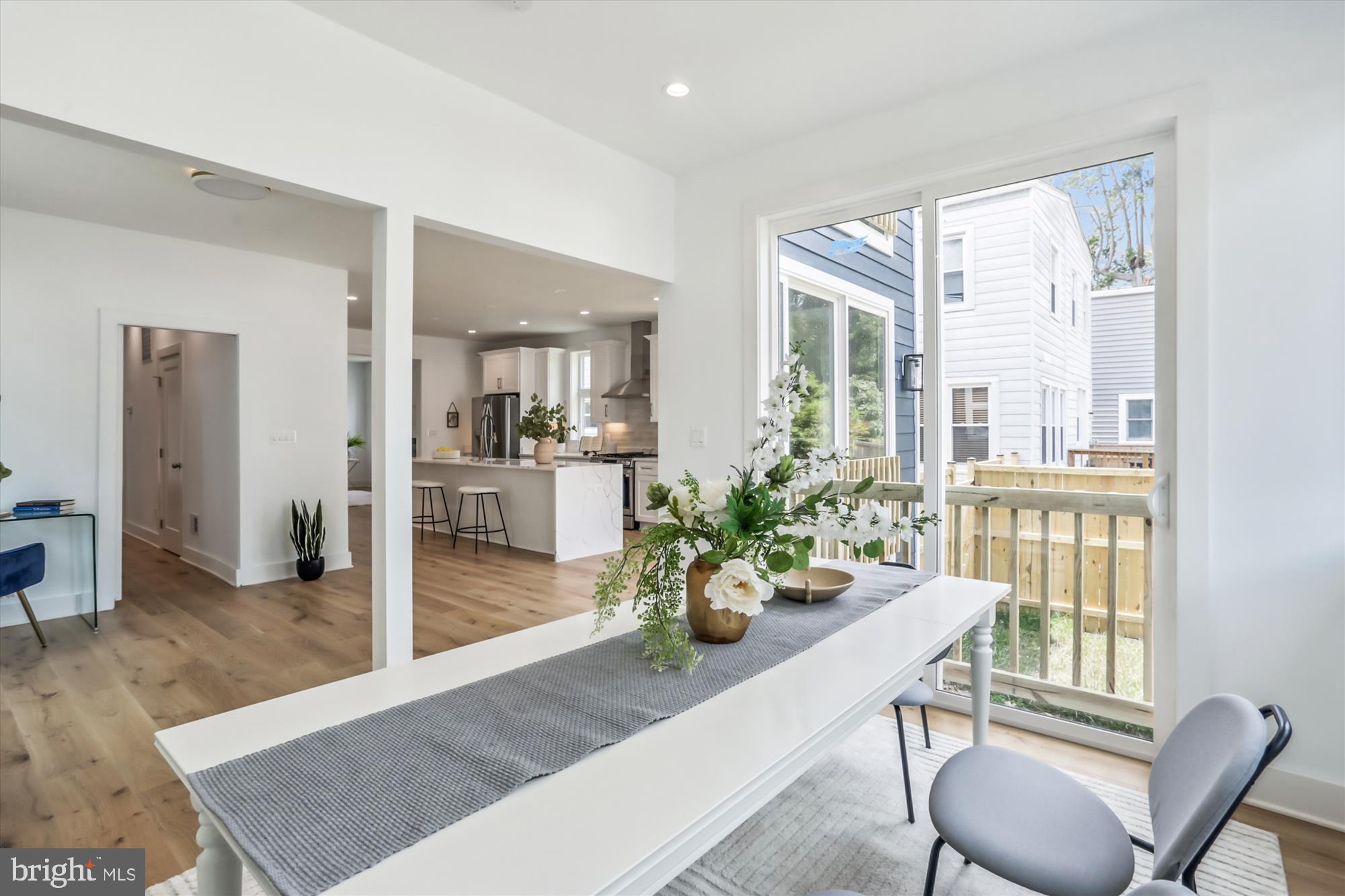 1341 Ingraham Street Northwest Washington, DC 20011 - Photo 14 of 51 a view of a dining room with furniture window and wooden floor