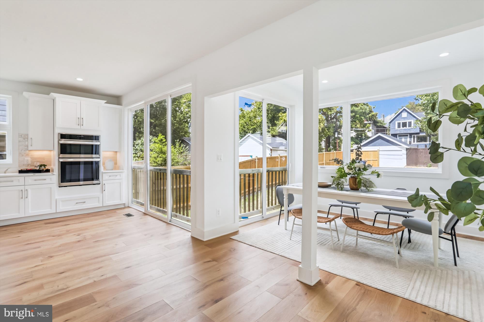 1341 Ingraham Street Northwest Washington, DC 20011 - Photo 17 of 51 a living room with furniture and a wooden floor