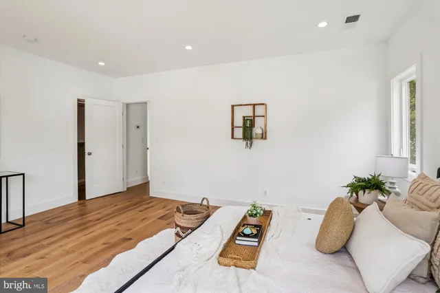 a bed room with a bed and a couch