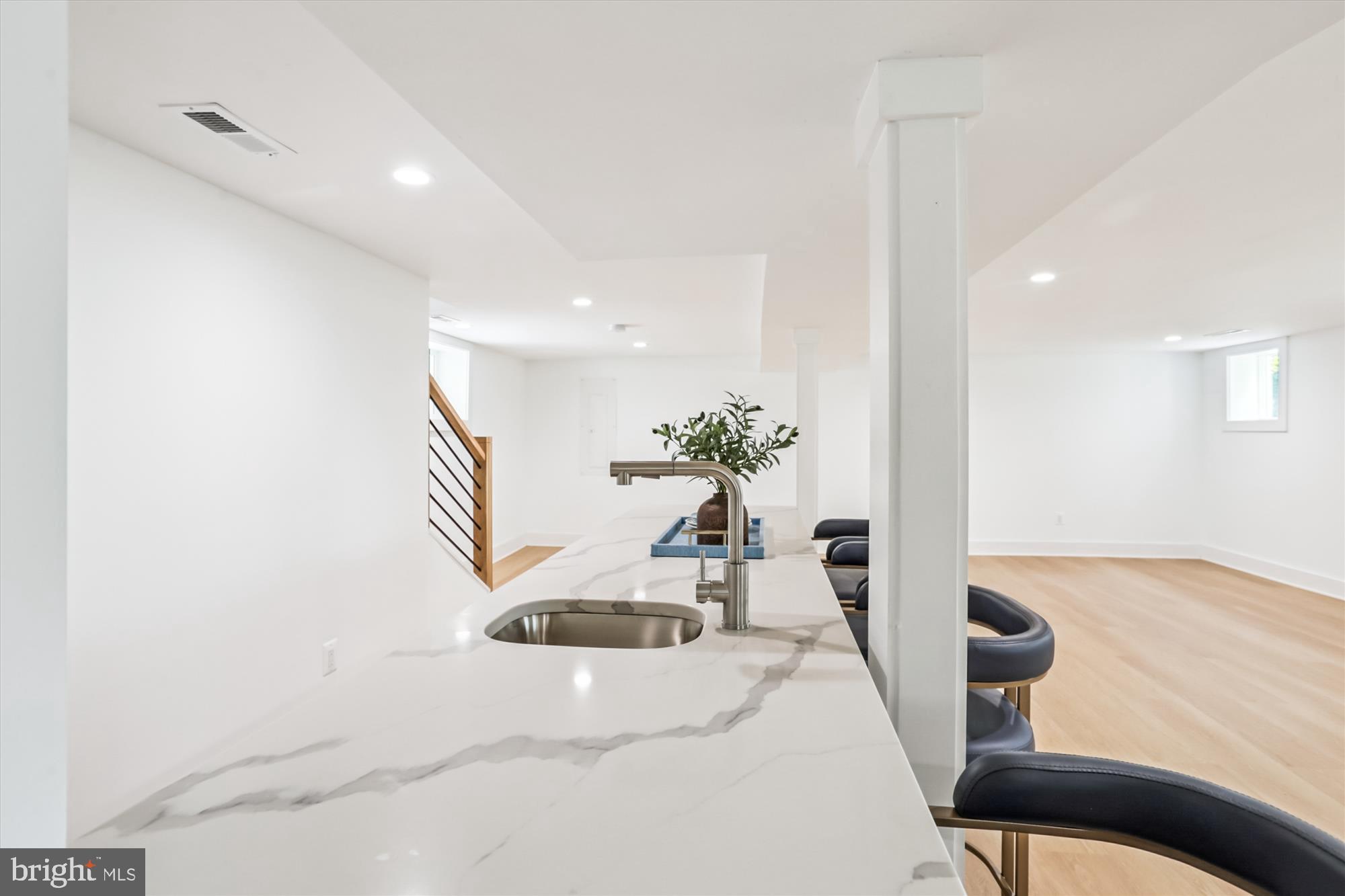 1341 Ingraham Street Northwest Washington, DC 20011 - Photo 39 of 51 a view of a living room and a potted plant