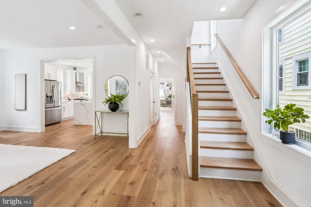 a view of entryway with wooden floor