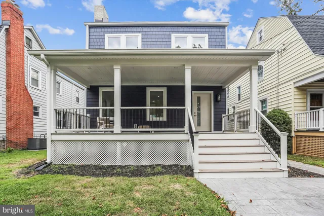 front view of a house with a small yard