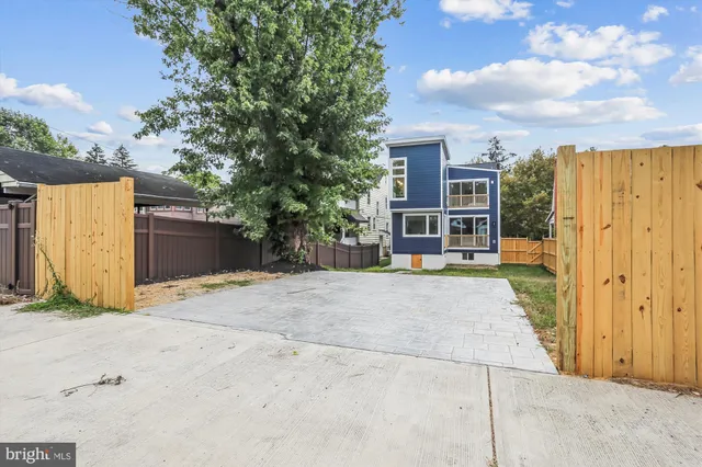 a house with trees in front of it
