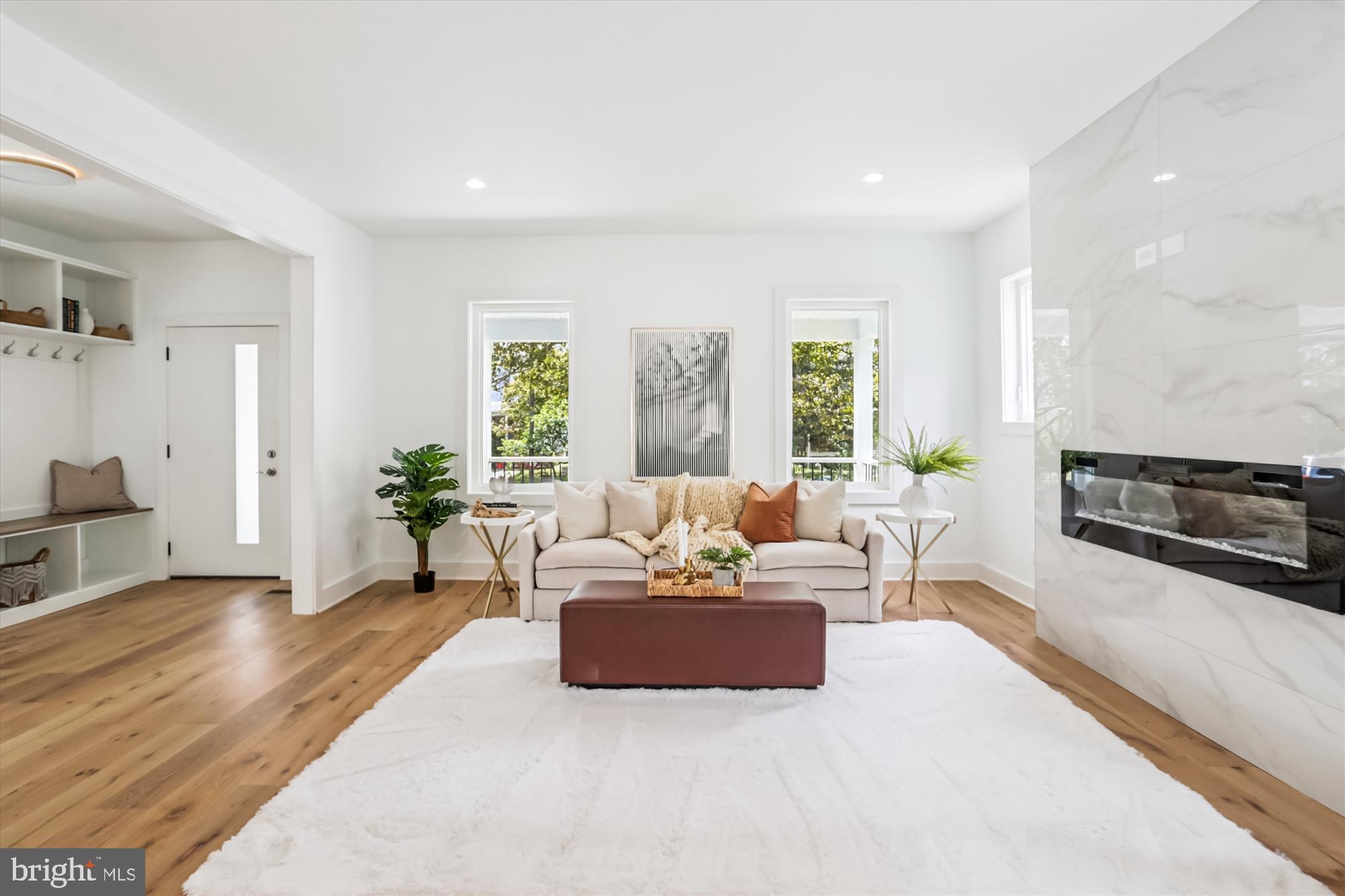 1341 Ingraham Street Northwest Washington, DC 20011 - Photo 8 of 51 a living room with furniture and a large window