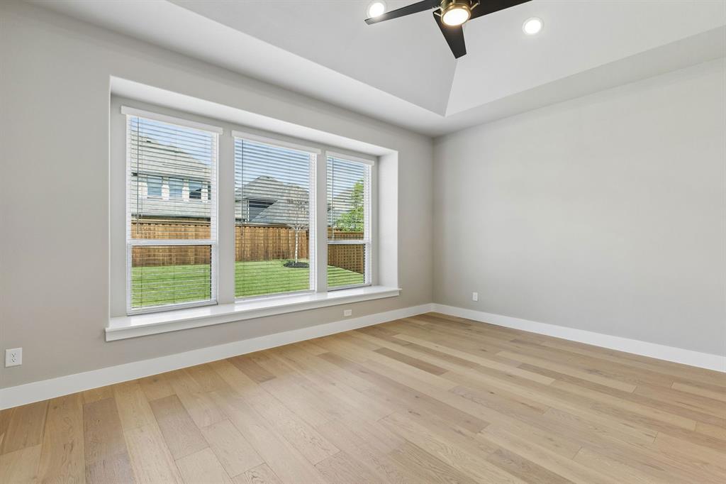 4512 Meander Way Prosper, TX 75078 - Photo 16 of 40 an empty room with a window