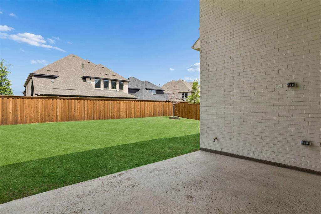 4512 Meander Way Prosper, TX 75078 - Photo 35 of 40 a view of an house with backyard space