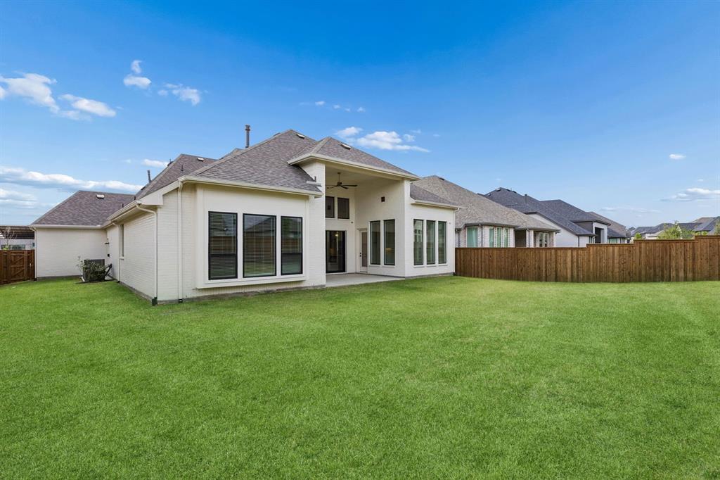 4512 Meander Way Prosper, TX 75078 - Photo 37 of 40 a view of a yard in front of house