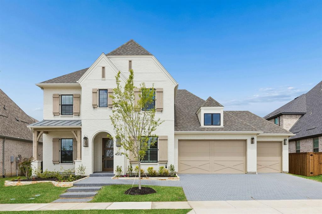 4512 Meander Way Prosper, TX 75078 - Photo 39 of 40 a front view of a house with a yard