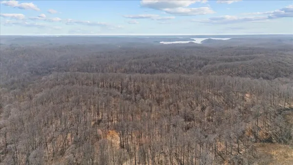 a view of beach and covered with fog