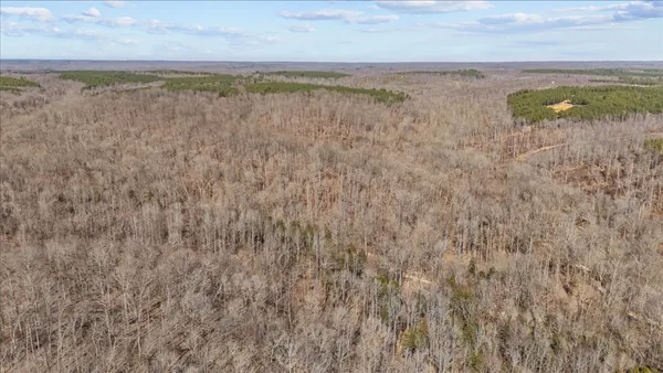 a view of beach and lake