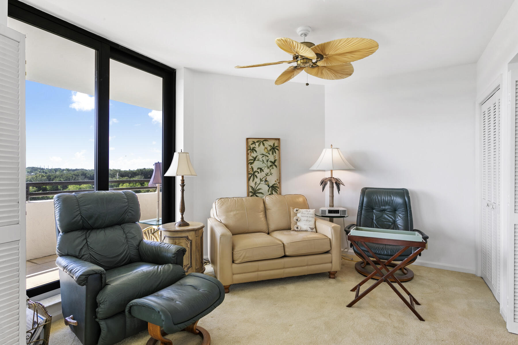 3322 Casseekey Island Road, Unit 504 Jupiter, FL 33477 - Photo 21 of 46 a living room with furniture and a window