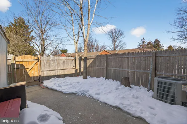 a view of a backyard of the house