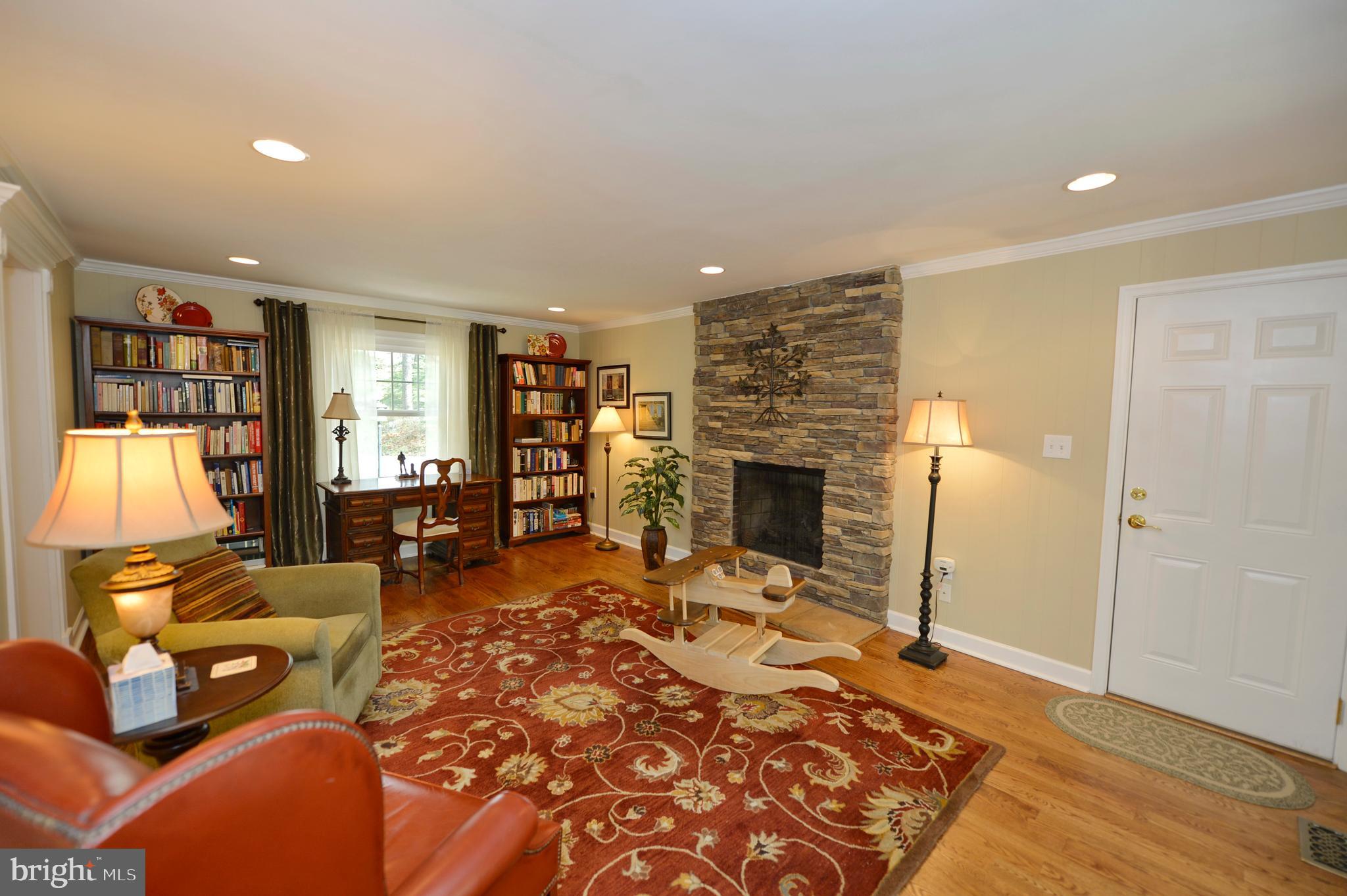11403 Running Cedar Road Reston, VA 20191 - Photo 15 of 58 Living room with LP Natural gas fireplace.