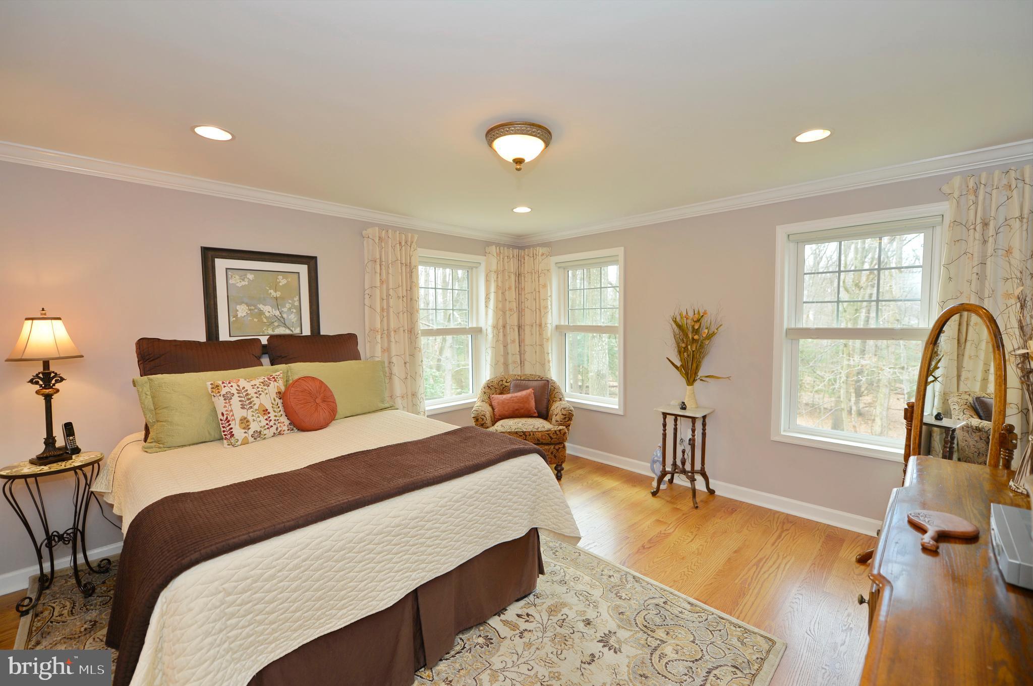 11403 Running Cedar Road Reston, VA 20191 - Photo 25 of 58 Impressive master bedroom.Hardwood floors continue