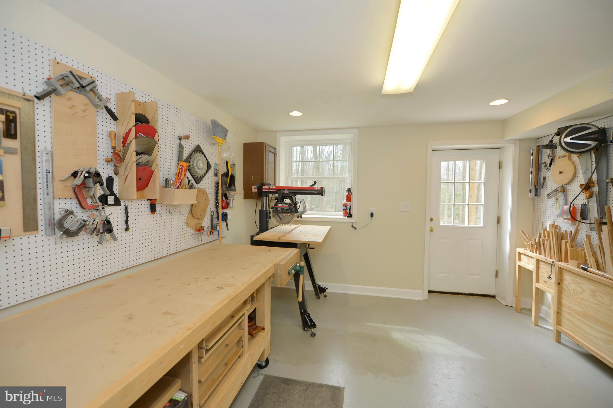 11403 Running Cedar Road Reston, VA 20191 - Photo 44 of 58 LL workshop with walkout to backyard level.