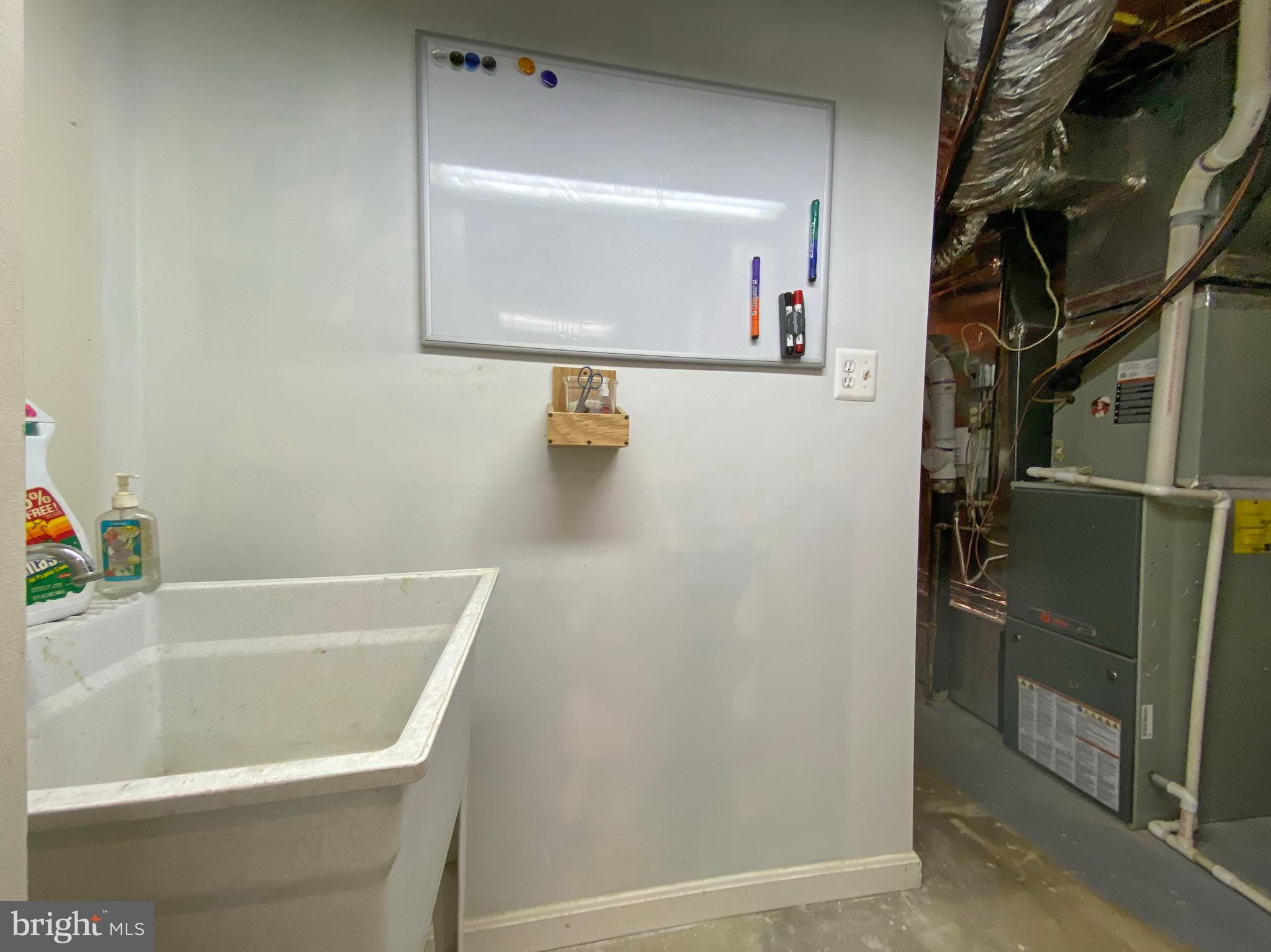 11403 Running Cedar Road Reston, VA 20191 - Photo 45 of 58 Lower level utility closet with utility sink.