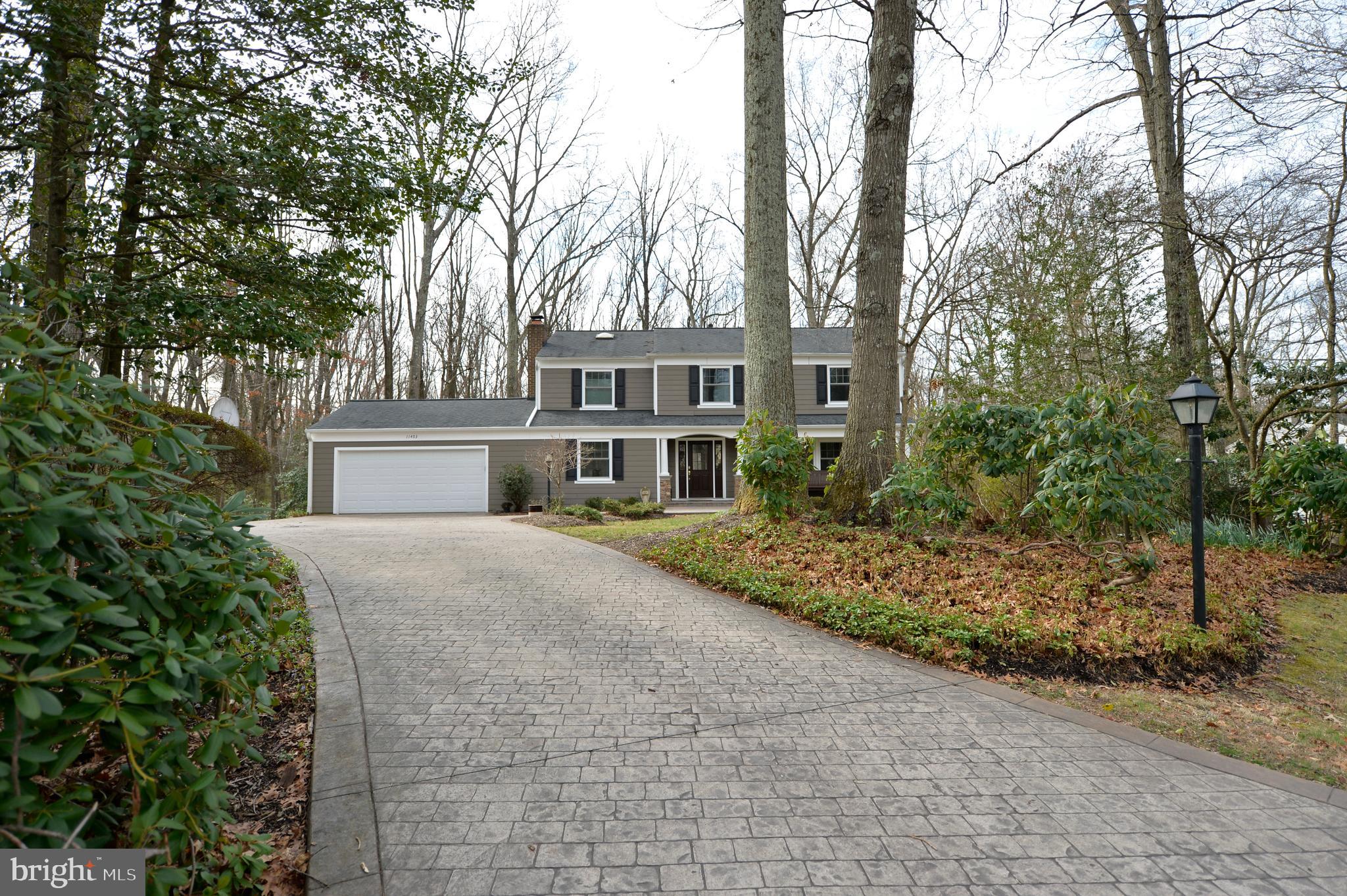 11403 Running Cedar Road Reston, VA 20191 - Photo 58 of 58 Stamped concrete driveway welcomes you home.