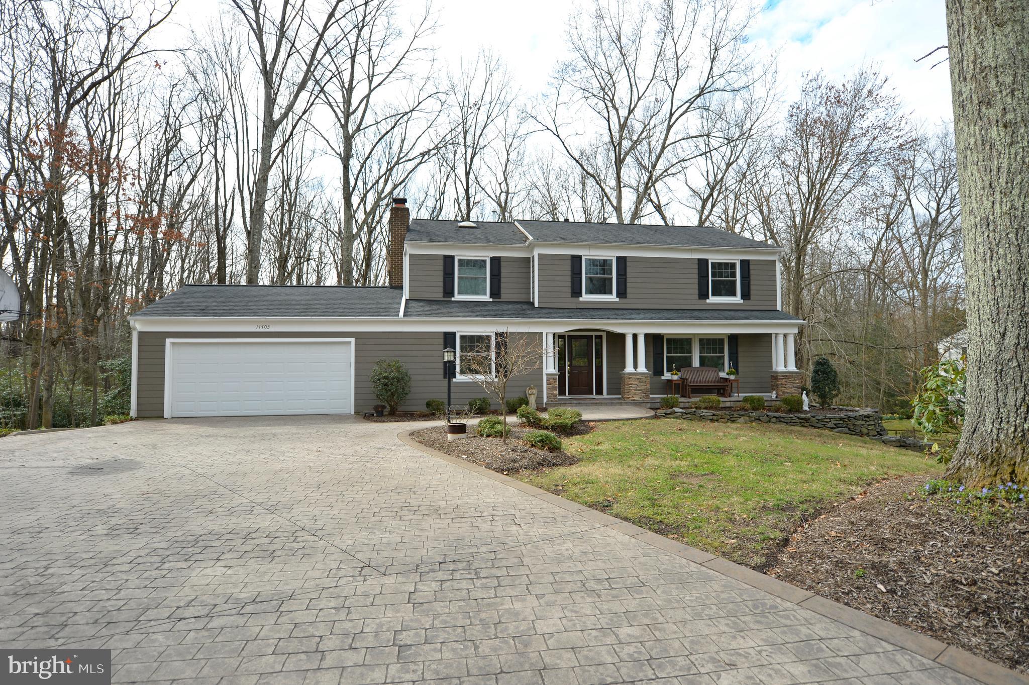 11403 Running Cedar Road Reston, VA 20191 - Photo 8 of 58 Front elevation with oversized two car garage.