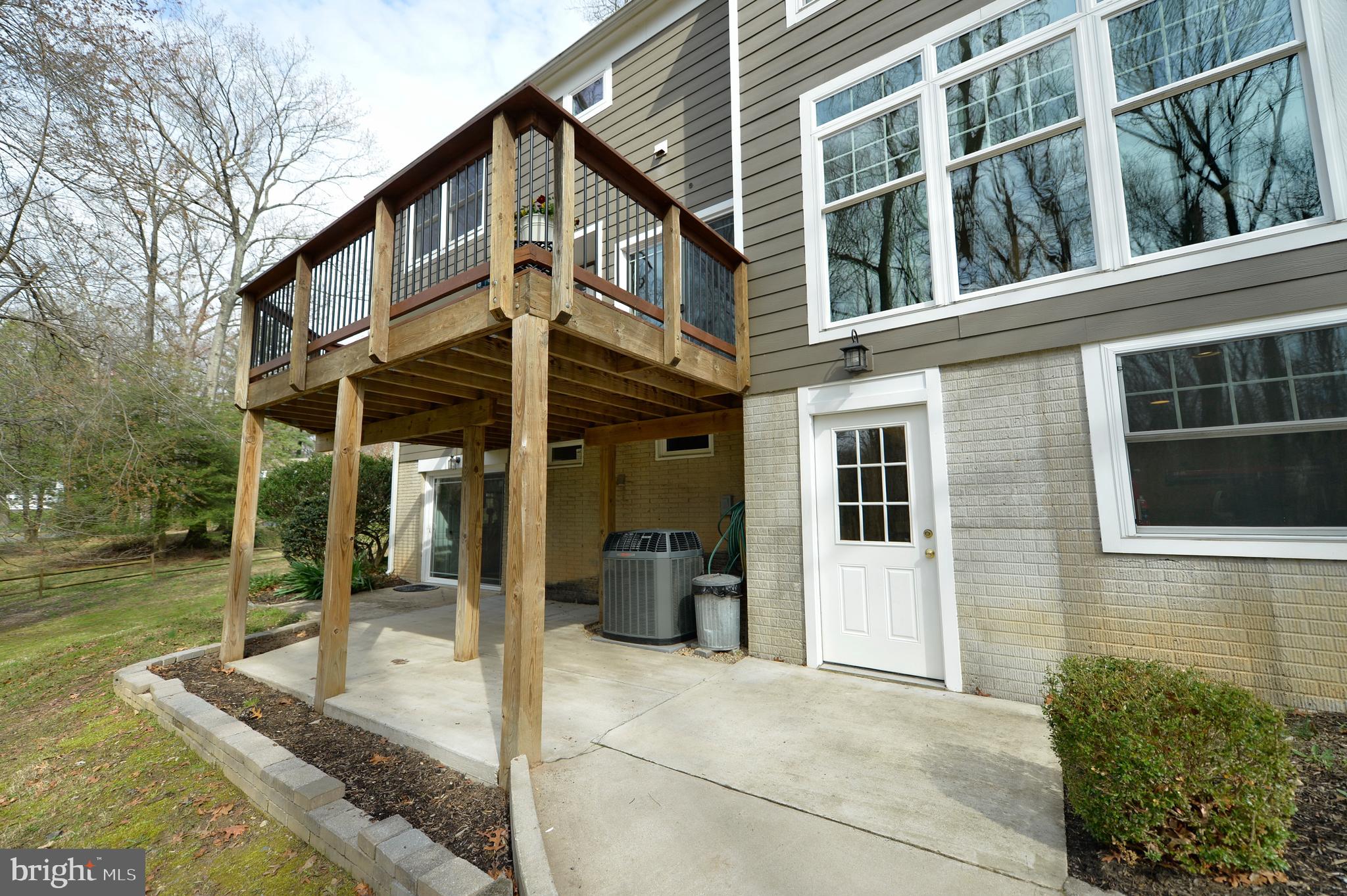 11403 Running Cedar Road Reston, VA 20191 - Photo 10 of 58 Patio view . Amazing windows for dining room.