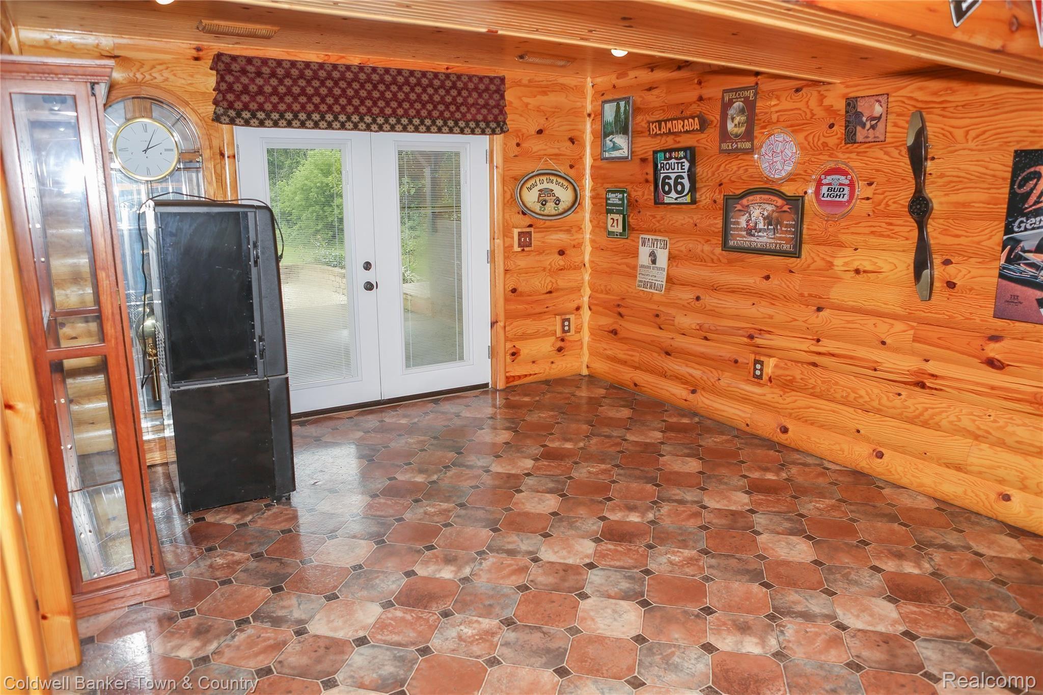 3188 West Coon Lake Road Howell, MI 48843 - Photo 54 of 65 Walk out to backyard