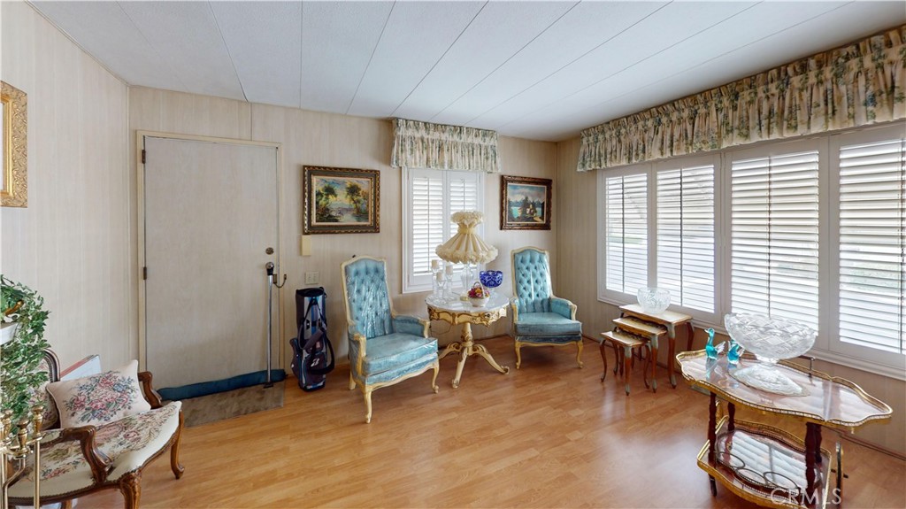 14851 Jeffrey Road, Unit 117 Irvine, CA 92618 - Photo 37 of 45 a living room with furniture and a window