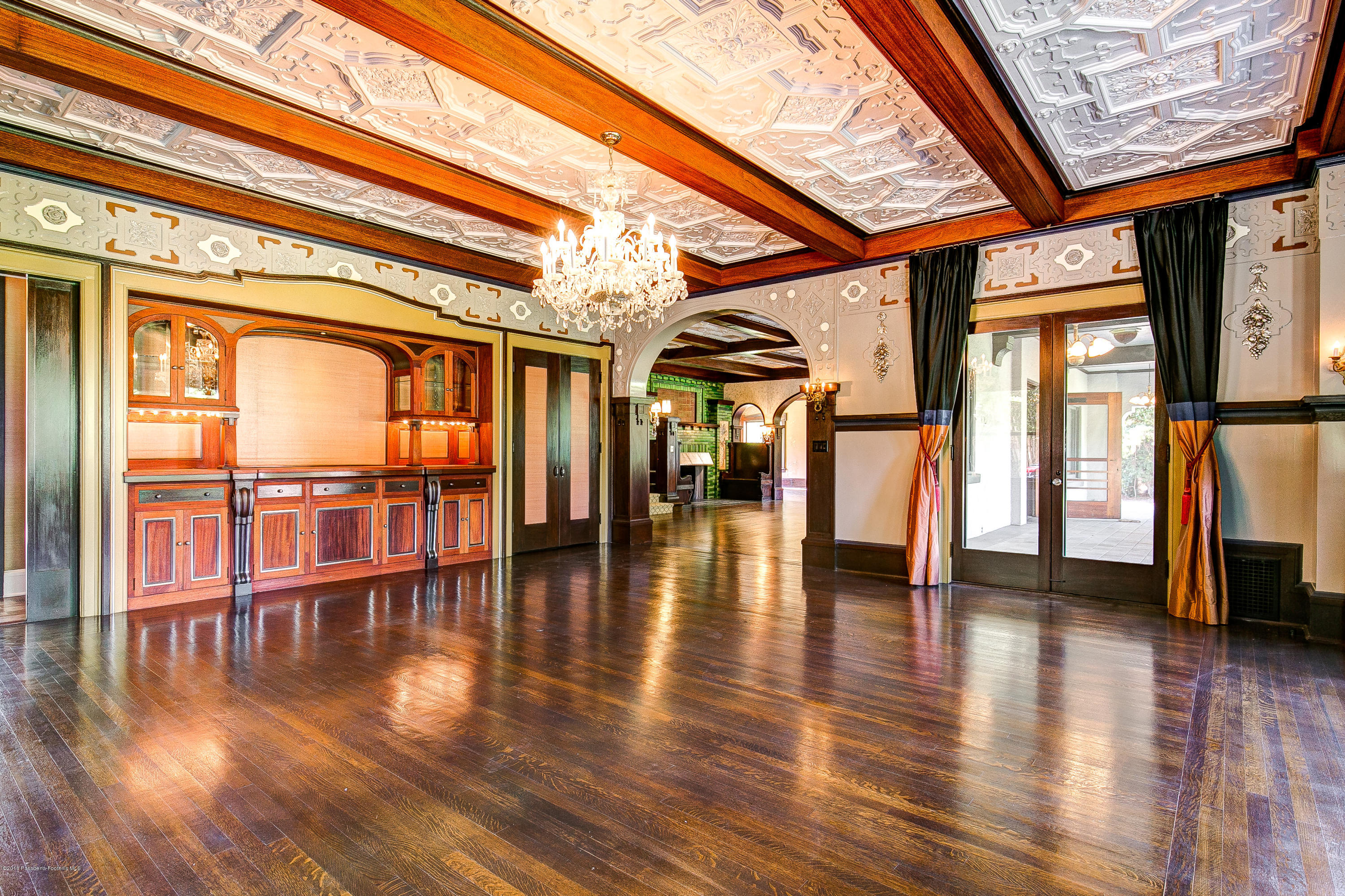 1333 Wentworth Avenue Pasadena, CA 91106 - Photo 13 of 60 a hallway with wooden floor and furniture