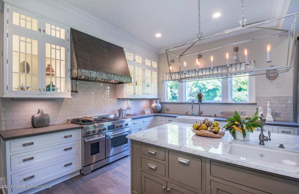 1333 Wentworth Avenue Pasadena, CA 91106 - Photo 15 of 60 a kitchen with stainless steel appliances a counter space a sink a stove and a window