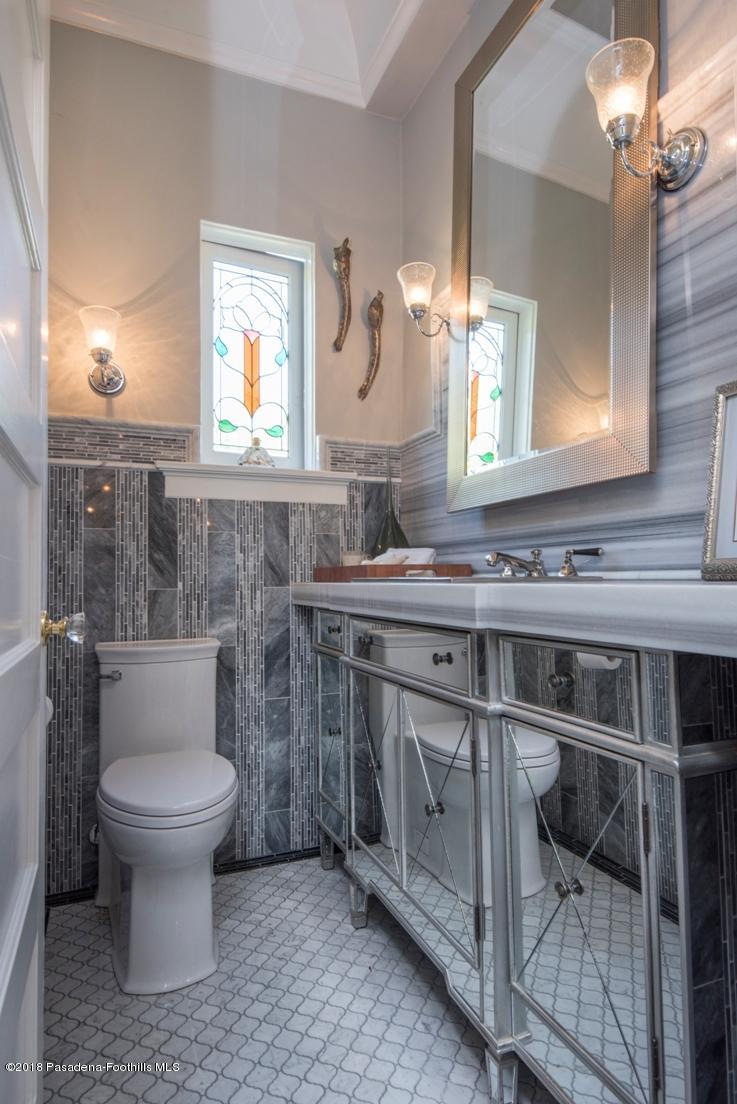 1333 Wentworth Avenue Pasadena, CA 91106 - Photo 19 of 60 a bathroom with a sink toilet and a mirror