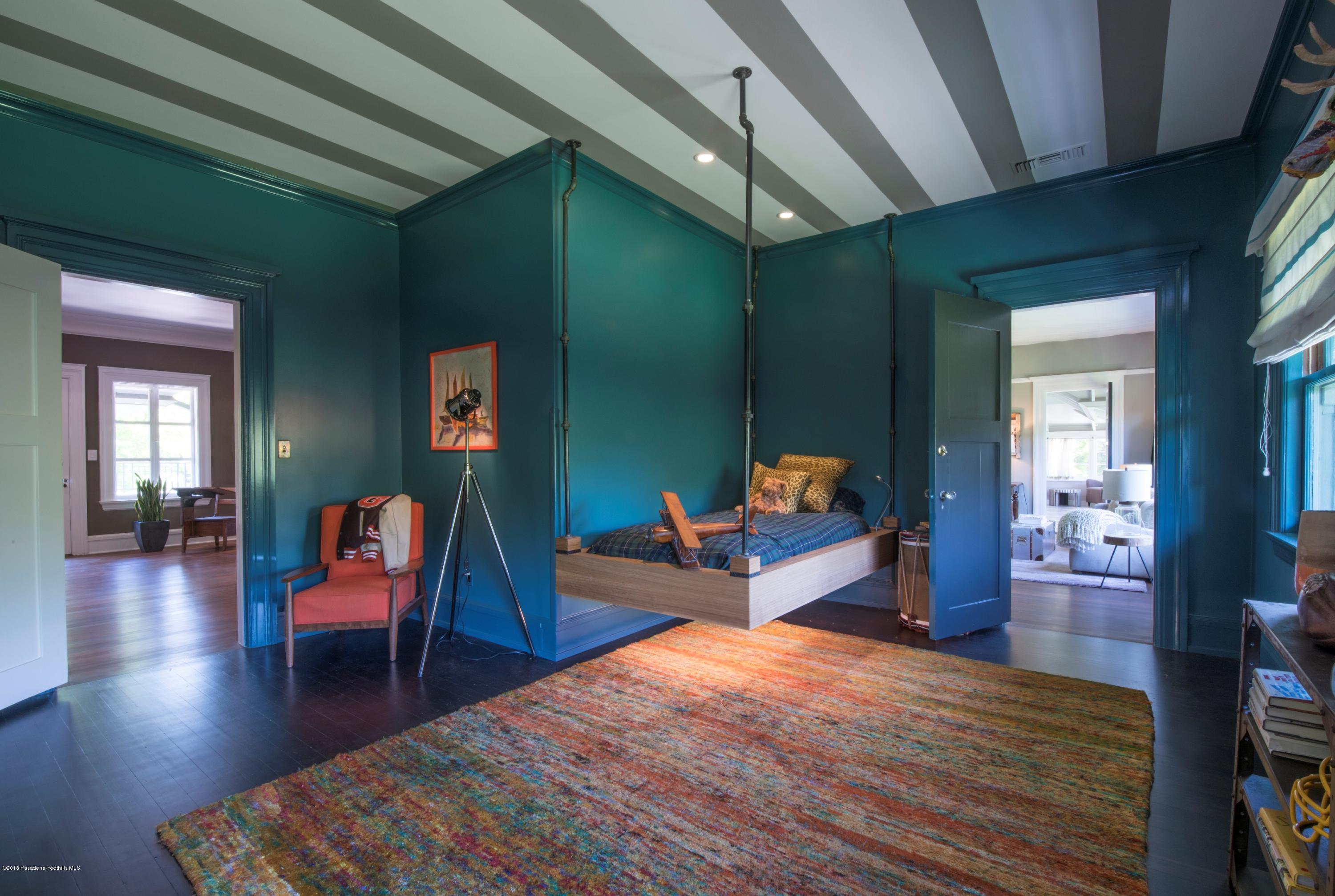 1333 Wentworth Avenue Pasadena, CA 91106 - Photo 29 of 60 a bedroom with furniture and a wooden floor