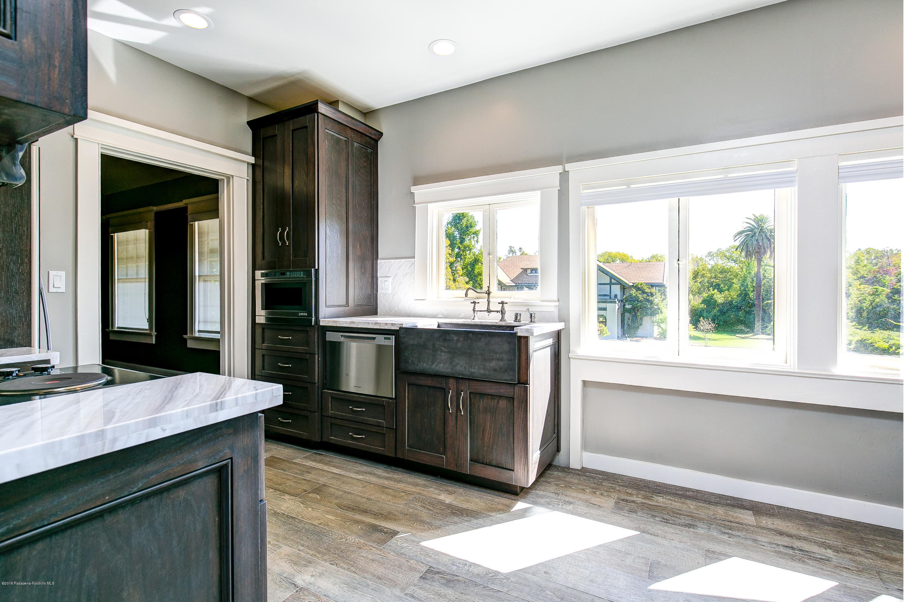 1333 Wentworth Avenue Pasadena, CA 91106 - Photo 37 of 60 a kitchen with a sink cabinets and window