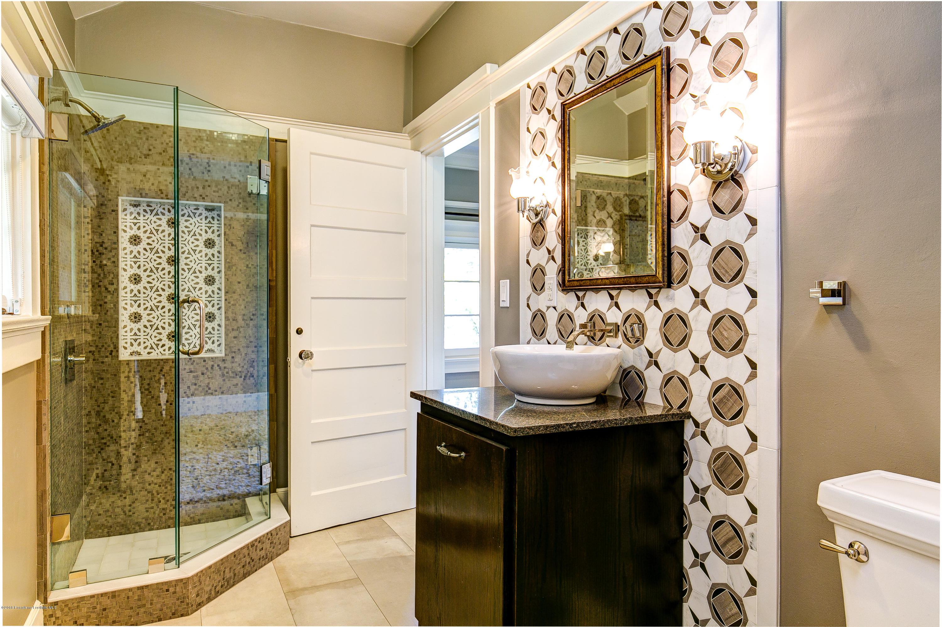 1333 Wentworth Avenue Pasadena, CA 91106 - Photo 42 of 60 a bathroom with a sink and a mirror