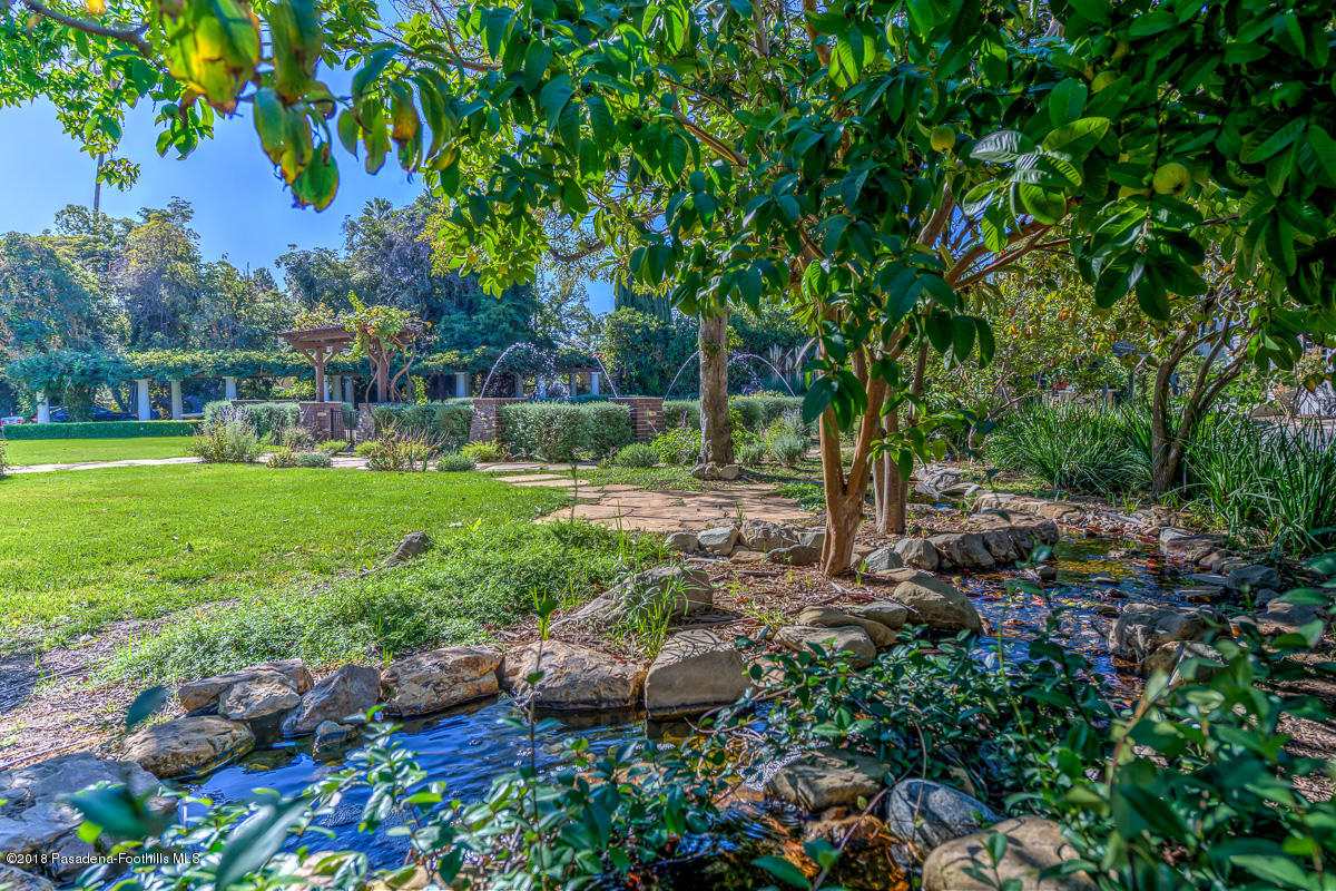 1333 Wentworth Avenue Pasadena, CA 91106 - Photo 55 of 60 a view of a garden with a bench