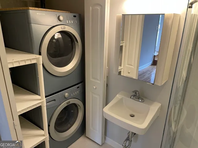 a utility room with dryer and washer