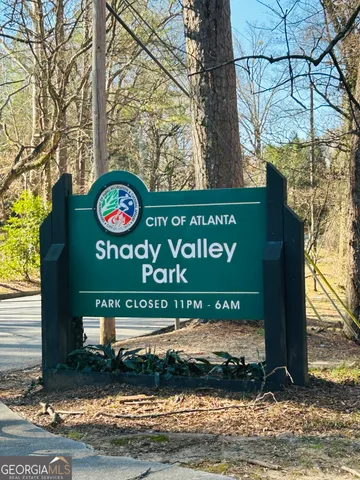 a sign on the side of a street