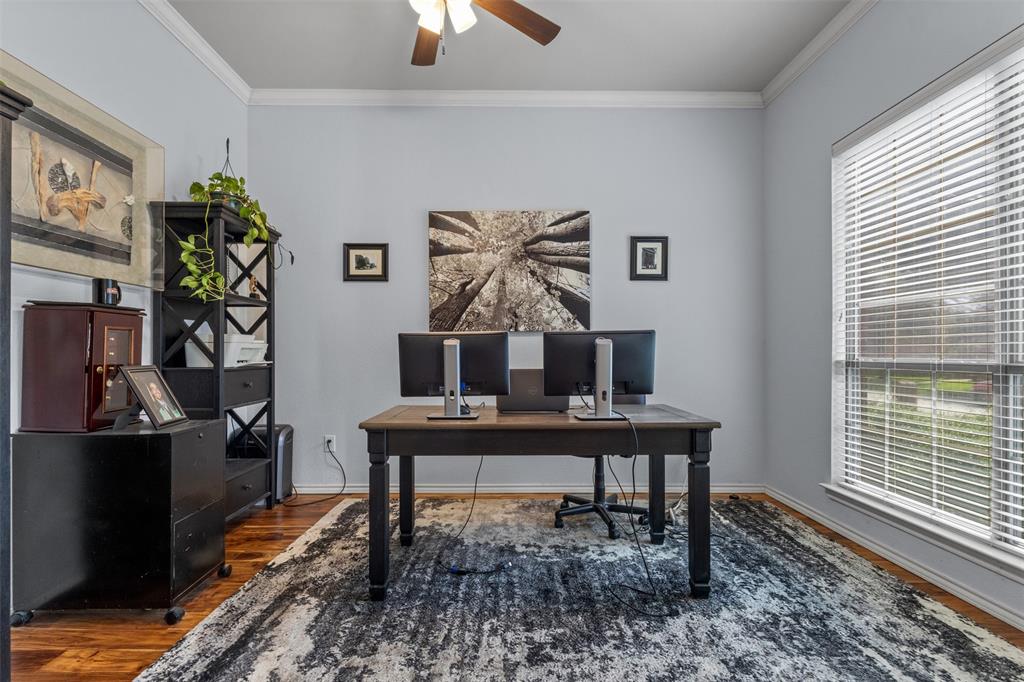 12334 Blue Ridge Drive Frisco, TX 75033 - Photo 14 of 32 a view of a workspace with furniture and a potted plant