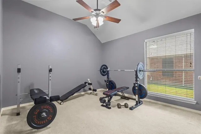a view of a room with gym equipment