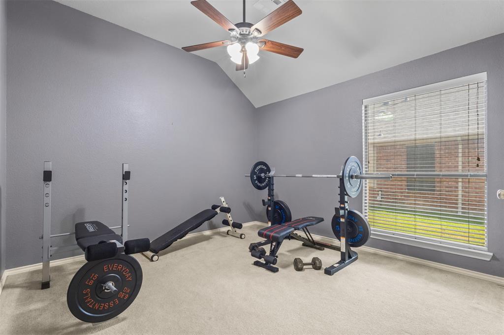 12334 Blue Ridge Drive Frisco, TX 75033 - Photo 22 of 32 a view of a room with gym equipment