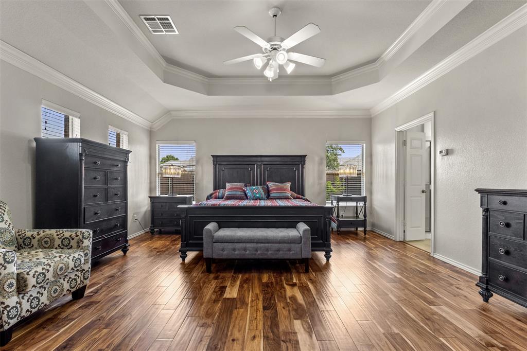 12334 Blue Ridge Drive Frisco, TX 75033 - Photo 3 of 32 a living room with furniture and a wooden floor