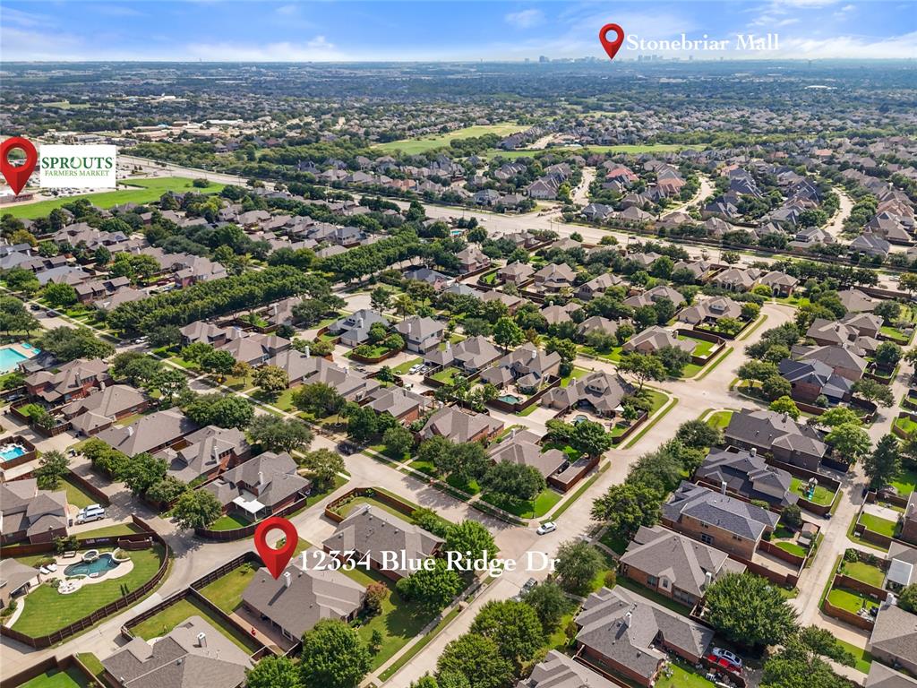 12334 Blue Ridge Drive Frisco, TX 75033 - Photo 29 of 32 an aerial view of city and lake