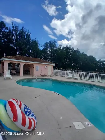 a view of a backyard of the house