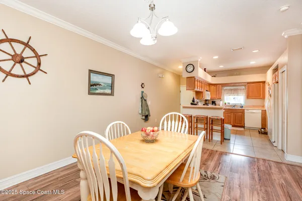 a kitchen with a stove a sink and cabinets