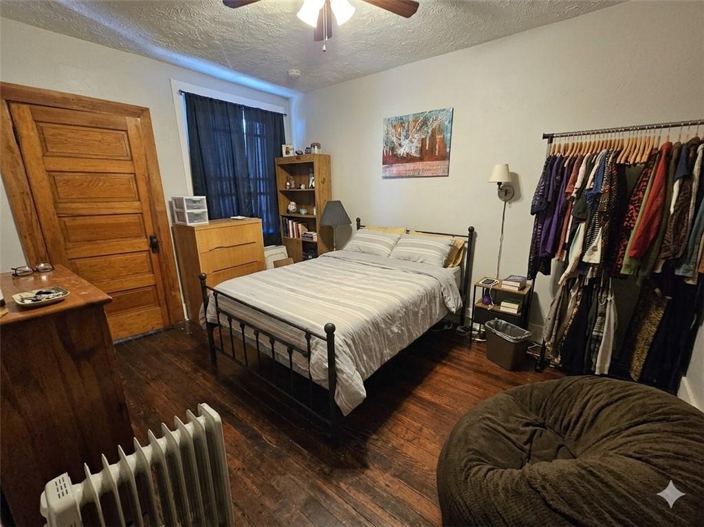 1962 Straubs Lane Pittsburgh, PA 15212 - Photo 21 of 35 a bed room with a bed and a couch