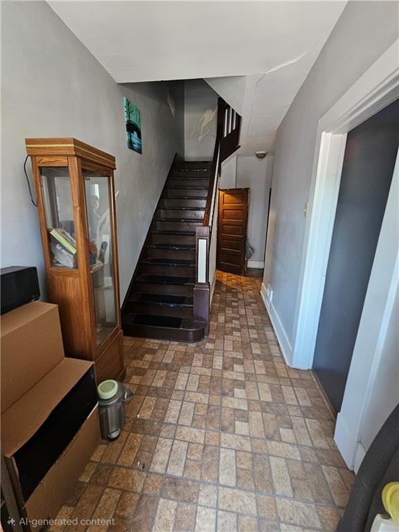1962 Straubs Lane Pittsburgh, PA 15212 - Photo 3 of 35 a view of a hallway with windows and stairs