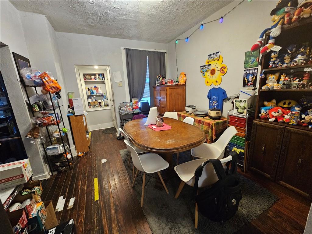 1962 Straubs Lane Pittsburgh, PA 15212 - Photo 6 of 35 a view of a dining room with furniture and wooden floor