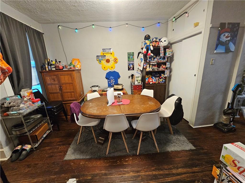 1962 Straubs Lane Pittsburgh, PA 15212 - Photo 8 of 35 a view of a dining room with furniture and wooden floor