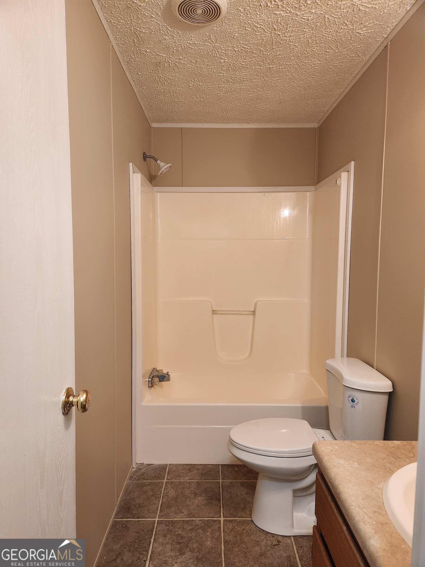 88 Dry Creek Road Danielsville, GA 30633 - Photo 12 of 20 a bathroom with a toilet and a shower