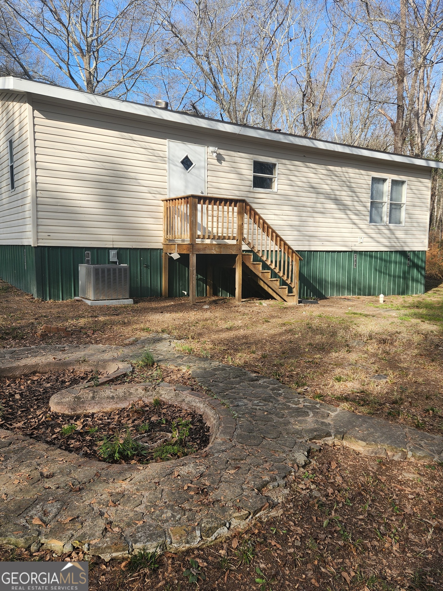 88 Dry Creek Road Danielsville, GA 30633 - Photo 17 of 20 a view of a house with a outdoor space