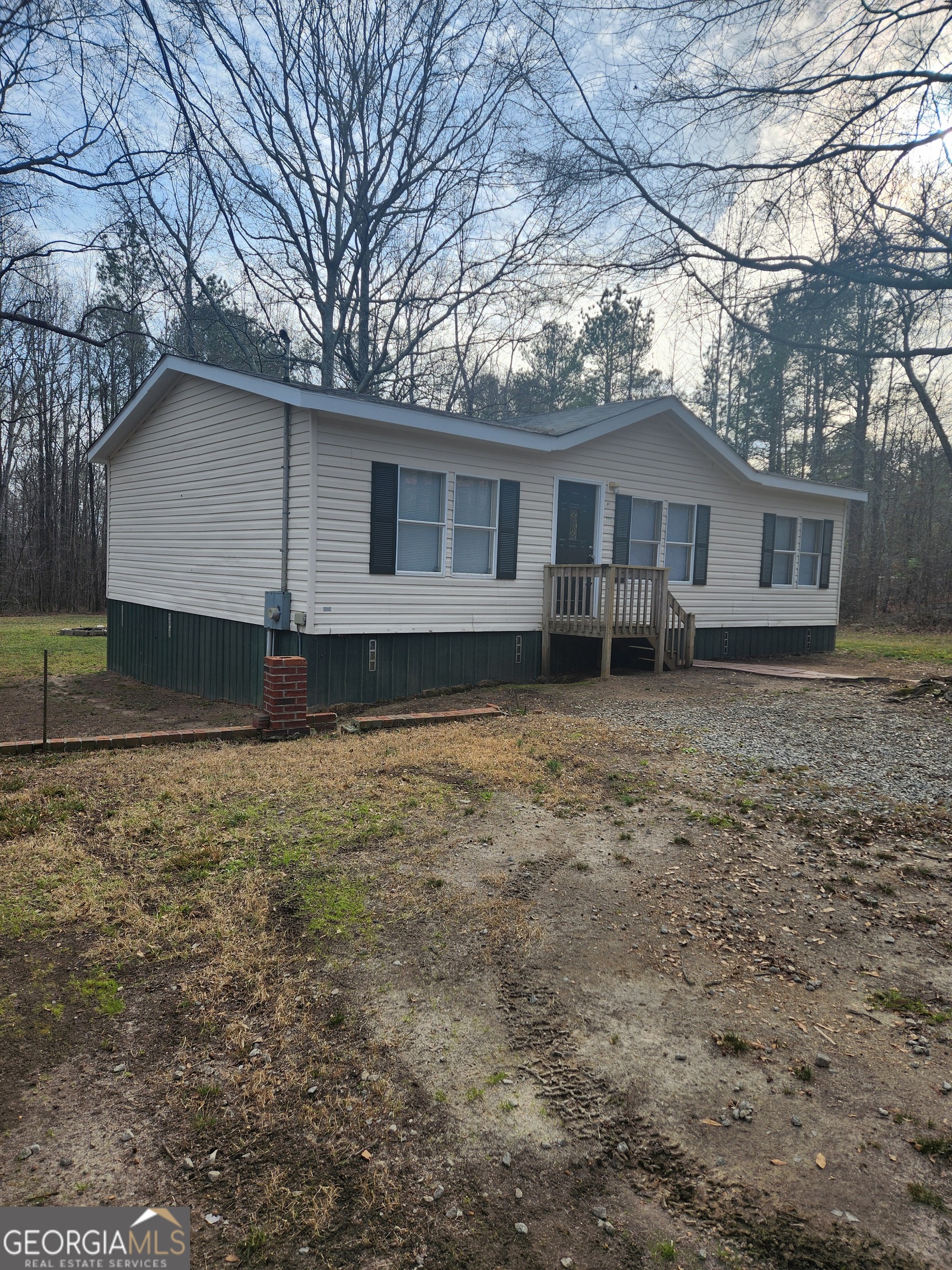 88 Dry Creek Road Danielsville, GA 30633 - Photo 4 of 20 a house view with a backyard space