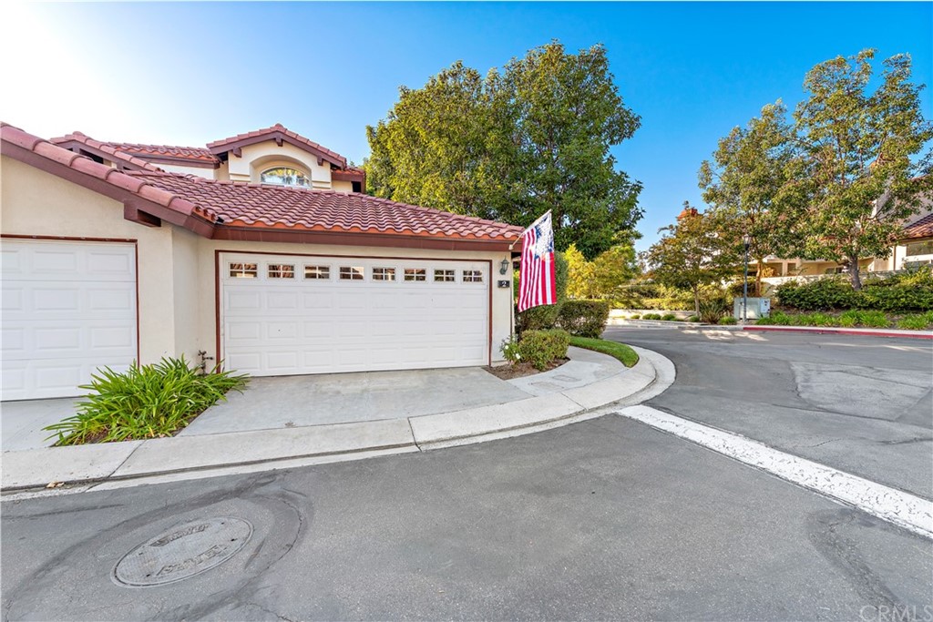 2 Vía Entrada Rancho Santa Margarita, CA 92688 - Photo 2 of 35 a sign on the side of a building