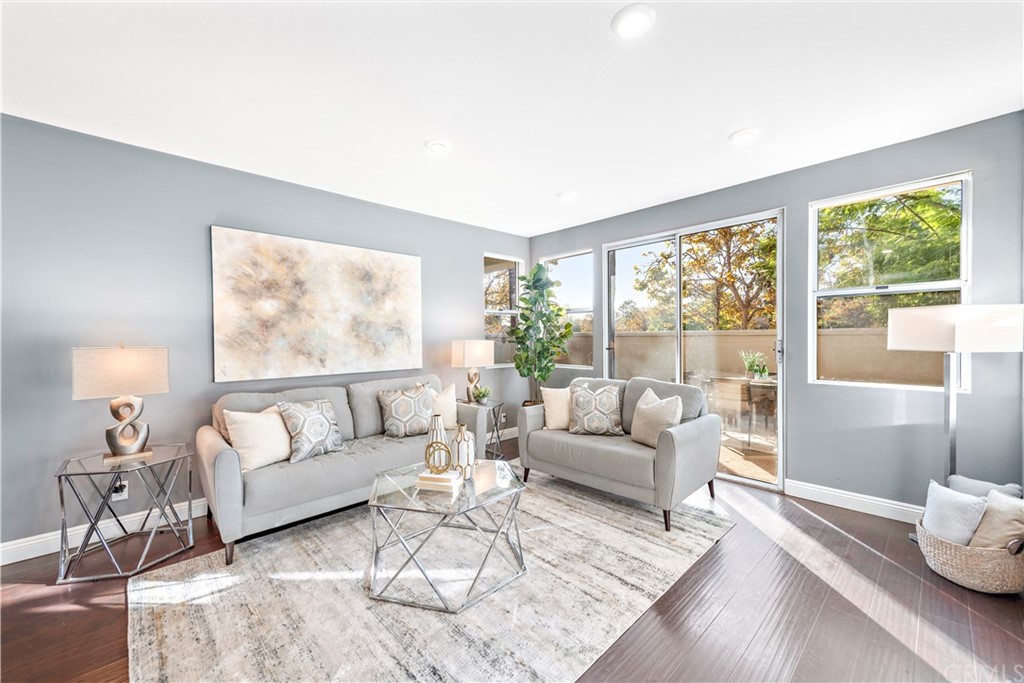 2 Vía Entrada Rancho Santa Margarita, CA 92688 - Photo 11 of 35 a living room with furniture and a large window